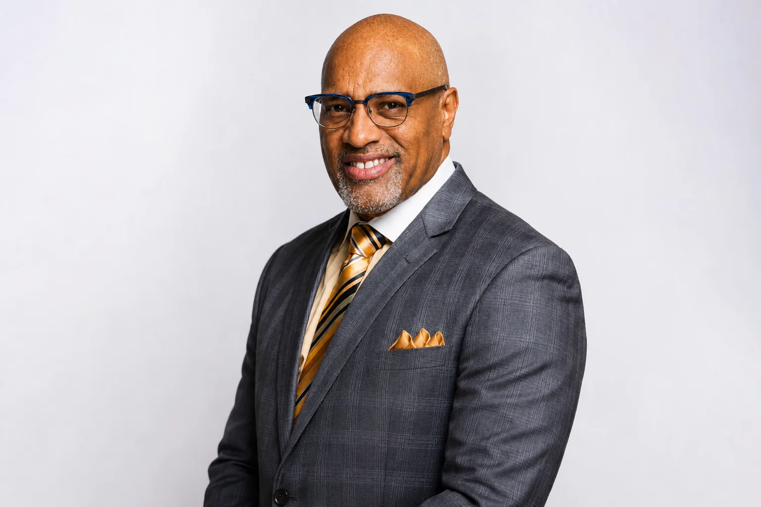 Dr. Nos in a tailored suit for his author portrait